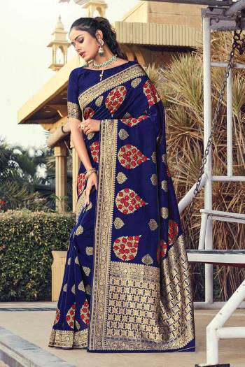 Look Attractive Wearing This Nevy Blue Colored Saree Paired With Blouse.  This Heavy Designer Pallu Border Wevon And Sirki Work Saree Is Silk Based Which Gives A Rich Look To Your Personality. Buy This Pretty Saree Now.