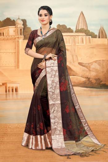 Look Attractive Wearing This Dark Dusty Colored Saree Paired With Blouse.  This Heavy Designer Saree Is Organza Based Which Gives A Rich Look To Your Personality. Buy This Pretty Saree Now.