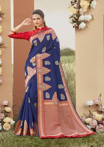 Adorn The Pretty Angelic Look Wearing This Heavy Designer Wevon Border Pallu With Sirki Work Saree In Dark Color Paired With Contrasting  Colored Blouse. This Saree Is Fabricated On Silk Paired With Silk Fabricated Blouse. Its Pretty Color Pallete Will Give An Attractive Look To Your Personality. 