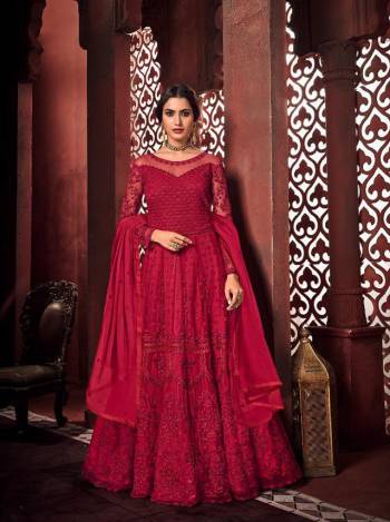 Look Pretty In This Beautiful Designer Floor Length Dress In Red Color Paired With Dupatta. This Semi-Stitched Dress Are Fabricated On Net Beautified With Pretty Embroidery. Buy Now