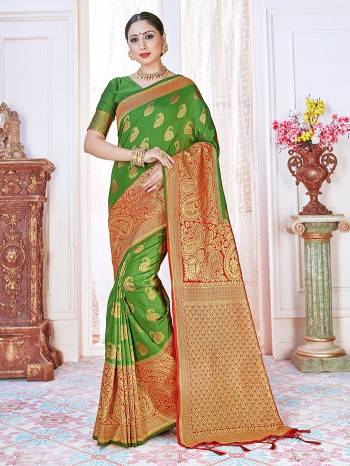 Adorn The Pretty Angelic Look Wearing This Heavy Designer Wevon Jacquard Saree In Dark Color Paired With Blouse. This Saree Is Fabricated On Banarasi Silk Paired With Banarasi Silk Fabricated Blouse. Its Pretty Color Pallete Will Give An Attractive Look To Your Personality. 