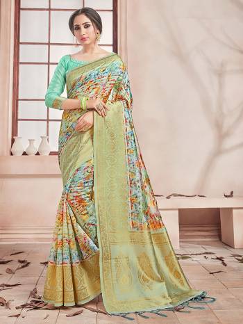 Celebrate This Festive Season In This Very Pretty Fine Colored Designer Saree Paired With Contrasting Colored Blouse. This Saree and Blouse Are Banarasi Silk Based Beautified With Detailed Wevon Border Pallu With Digital Print. 