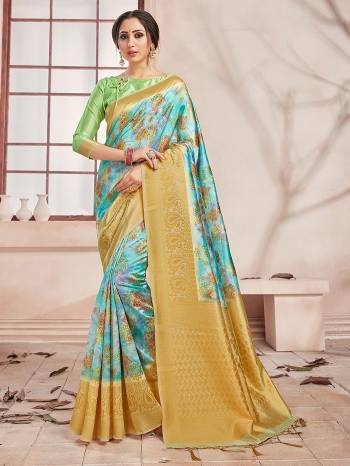 Celebrate This Festive Season In This Very Pretty Fine Colored Designer Saree Paired With Contrasting Colored Blouse. This Saree and Blouse Are Banarasi Silk Based Beautified With Detailed Wevon Border Pallu With Digital Print. 