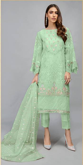 Look This Pretty Heavy Embroidered Pakistani Designer Salwar Kameez In Green Color. Its Embroidered Top Is Organza Based Paired With Santoon Bottom and Organza Fabricated Embroidered Dupatta.