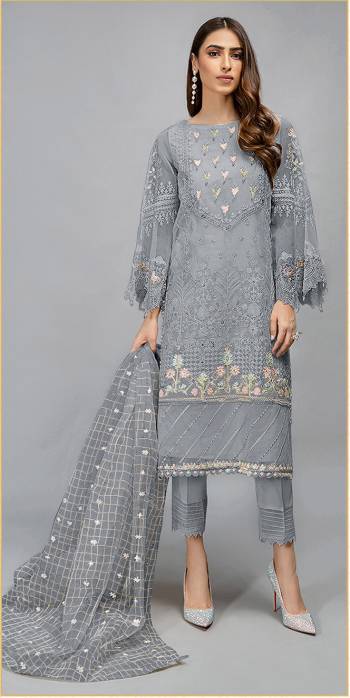 Look This Pretty Heavy Embroidered Pakistani Designer Salwar Kameez In Grey Color. Its Embroidered Top Is Organza Based Paired With Santoon Bottom and Organza Fabricated Embroidered Dupatta.