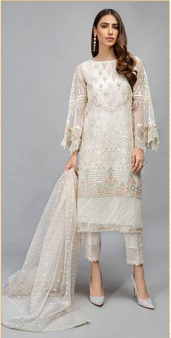 Look This Pretty Heavy Embroidered Pakistani Designer Salwar Kameez In Off White Color. Its Embroidered Top Is Organza Based Paired With Santoon Bottom and Organza Fabricated Embroidered Dupatta.