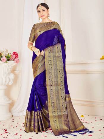 Look Attractive Wearing This Purple Colored Saree Paired With Blouse.  This Heavy Wevon Jacquard Designer Saree Is Banarasi Silk Based Which Gives A Rich Look To Your Personality. Buy This Pretty Saree Now.