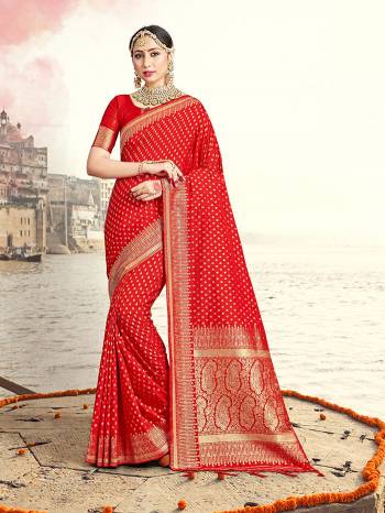 Grab This Pretty Elegant Looking Designer Saree In Dark Color Paired With Contrasting Blouse. This Saree And Blouse Are Banarasi Silk Based Beautified With Heavy Wevon Designer Work. Buy Now.