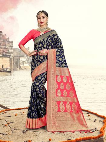 Grab This Pretty Elegant Looking Designer Saree In Dark Color Paired With Contrasting Blouse. This Saree And Blouse Are Banarasi Silk Based Beautified With Heavy Wevon Designer Work. Buy Now.