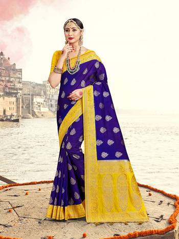 Grab This Pretty Elegant Looking Designer Saree In Dark Color Paired With Contrasting Blouse. This Saree And Blouse Are Banarasi Silk Based Beautified With Heavy Wevon Designer Work. Buy Now.