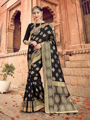 Grab This Pretty Elegant Looking Designer Saree In Dark Color Paired With Contrasting Blouse. This Saree And Blouse Are Banarasi Silk Based Beautified With Heavy Wevon Designer Work. Buy Now.