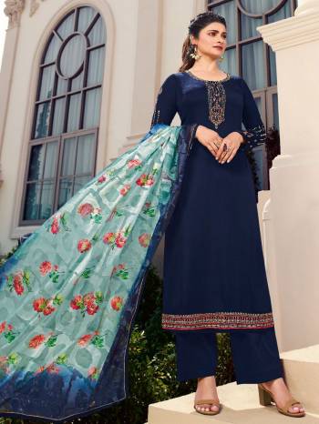 Here Is A Very Pretty Designer Straight Suit In Nevy Blue Color. Its Embroidered Top and Bottom Are Fabricated On Tusser Satin Paired with Brasso With Digital Print Fabricated Dupatta. Its Fabrics Are Soft Towards Skin And Esnures Superb Comfort All Day Long