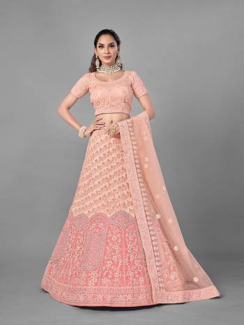 Look Pretty In This Beautiful Heavy Designer Lehenga Choli Is Light Color. This Attractive Embroidered Lehenga Choli Is Fabricated On Soft Net Paired With Soft Net Fabricated Dupatta. It Is Light In Weight And Easy To Carry All Day Long.