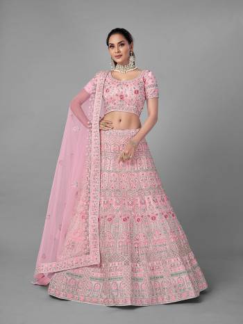 Look Pretty In This Beautiful Heavy Designer Lehenga Choli Is Light Color. This Attractive Embroidered Lehenga Choli Is Fabricated On Soft Net Paired With Soft Net Fabricated Dupatta. It Is Light In Weight And Easy To Carry All Day Long.