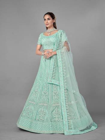 Look Pretty In This Beautiful Heavy Designer Lehenga Choli Is Light Color. This Attractive Embroidered Lehenga Choli Is Fabricated On Soft Net Paired With Soft Net Fabricated Dupatta. It Is Light In Weight And Easy To Carry All Day Long.