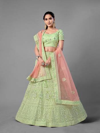 Look Pretty In This Beautiful Heavy Designer Lehenga Choli Is Light Color. This Attractive Embroidered Lehenga Choli Is Fabricated On Soft Net Paired With Soft Net Fabricated Dupatta. It Is Light In Weight And Easy To Carry All Day Long.