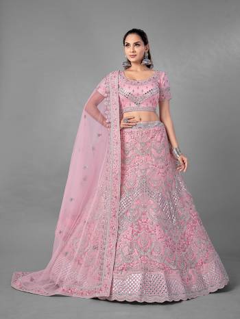 Look Pretty In This Beautiful Heavy Designer Lehenga Choli Is Light Color. This Attractive Embroidered Lehenga Choli Is Fabricated On Soft Net Paired With Soft Net Fabricated Dupatta. It Is Light In Weight And Easy To Carry All Day Long.