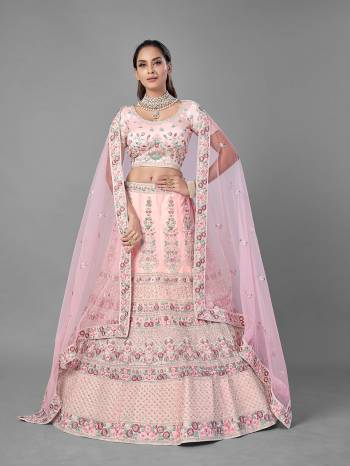 Look Pretty In This Beautiful Heavy Designer Lehenga Choli Is Light Color. This Attractive Embroidered Lehenga Choli Is Fabricated On Soft Net Paired With Soft Net Fabricated Dupatta. It Is Light In Weight And Easy To Carry All Day Long.