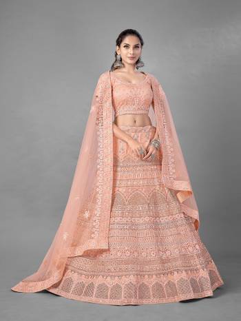 Look Pretty In This Beautiful Heavy Designer Lehenga Choli Is Light Color. This Attractive Embroidered Lehenga Choli Is Fabricated On Soft Net Paired With Soft Net Fabricated Dupatta. It Is Light In Weight And Easy To Carry All Day Long.