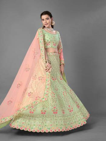 This Beautiful Heavy Designer Lehenga Choli Is Pista Color. This Attractive Embroidered Lehenga Choli Is Fabricated On Art Silk Paired With Soft Net Fabricated Dupatta. It Is Light In Weight And Easy To Carry All Day Long.