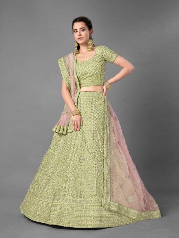 This Beautiful Heavy Designer Lehenga Choli Is Pista Color. This Attractive Embroidered Lehenga Choli Is Fabricated On Art Silk Paired With Soft Net Fabricated Dupatta. It Is Light In Weight And Easy To Carry All Day Long.