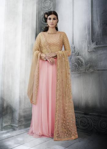 Look Pretty This Designer Floor Length Suit In Lovely  Color.?Its Pretty Embroidred Top Is Net Based Paired With Santoon Bottom And Net Fabricated Dupatta Which Gives An Attractive To The Suit.