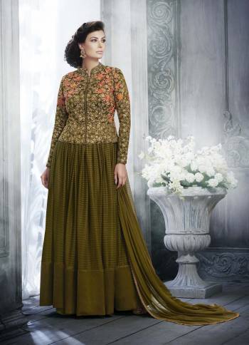 Look Pretty This Designer Floor Length Suit In Lovely  Color.?Its Pretty Embroidred Top Is Net Based Paired With Santoon Bottom And Chiffon Fabricated Embroidered Dupatta Which Gives An Attractive To The Suit.