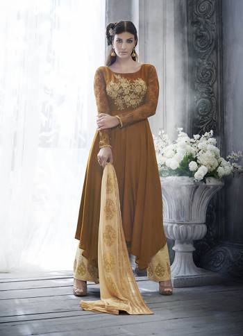 Look Pretty This Designer Floor Length Suit In Lovely  Color.?Its Pretty Embroidred Top Is Handloom Silk Based Paired With Khadi Silk Bottom And Chiffon Fabricated Dupatta Which Gives An Attractive To The Suit.