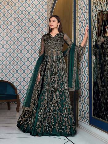 You Will Definitely Earn Lots Of Compliments Wearing This Lovely Indo-Western Heavy Designer Suit In Fine Color. Its Top Is Fabricated On Net paired With Satin Silk Bottom And Net Fabricated Dupatta.