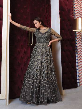 You Will Definitely Earn Lots Of Compliments Wearing This Lovely Indo-Western Heavy Designer Suit In Fine Color. Its Top Is Fabricated On Net paired With Santoon Bottom And Net Fabricated Dupatta.