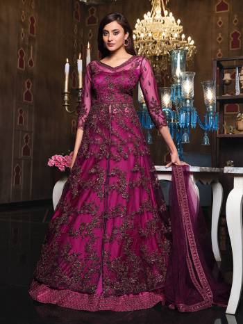 You Will Definitely Earn Lots Of Compliments Wearing This Lovely Indo-Western Heavy Designer Suit In Fine Color. Its Top Is Fabricated On Net paired With Satin Bottom And Net Fabricated Dupatta.