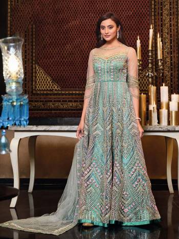 You Will Definitely Earn Lots Of Compliments Wearing This Lovely Indo-Western Heavy Designer Suit In Fine Color. Its Top Is Fabricated On Net paired With Santoon Bottom And Net Fabricated Dupatta.