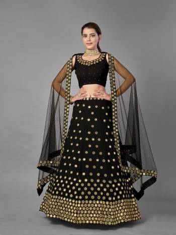 Evergreen Combination Is Here With This Heavy Designer Lehenga Choli In Black Color. Its Blouse And Lehenga Are Fabricated On Georgette Paired With Soft Net Fabricated Dupatta. Buy Now