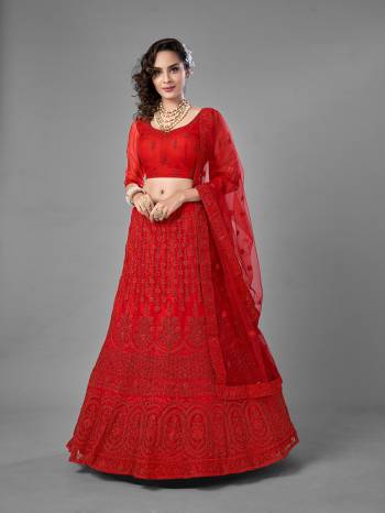 Evergreen Combination Is Here With This Heavy Designer Lehenga Choli In Red Color. Its Blouse And Lehenga Are Fabricated On Soft Net Paired With Soft Net Fabricated Dupatta. Buy Now