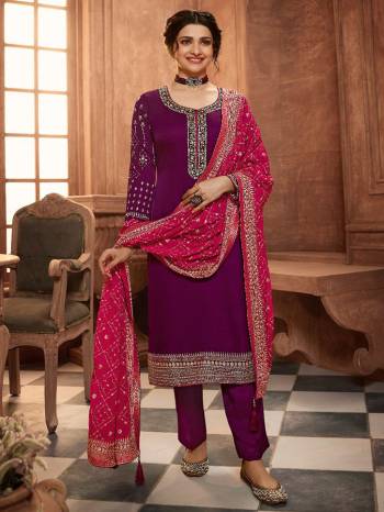 Grab This Very Beautiful Designer Straight Suit In Burgundy Color Paired With Pretty Embroidered Contrasted Colored Dupatta. Its Top Is Fabricated On Satin Georgette Paired With Santoon Bottom and Chinon Fabricated Dupatta. Buy This Designer Embroidered Suit Now