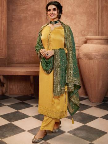 Grab This Very Beautiful Designer Straight Suit In Yellow Color Paired With Pretty Embroidered Contrasted Colored Dupatta. Its Top Is Fabricated On Satin Georgette Paired With Santoon Bottom and Chinon Fabricated Dupatta. Buy This Designer Embroidered Suit Now