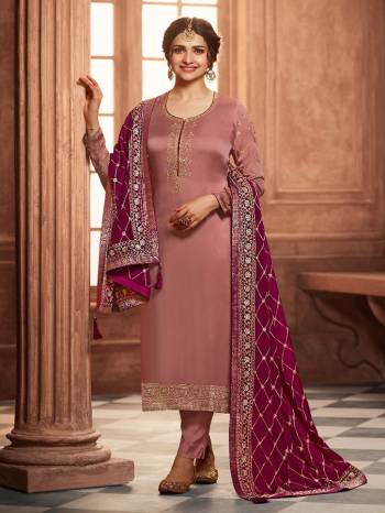 Grab This Very Beautiful Designer Straight Suit In Brown Color Paired With Pretty Embroidered Contrasted Colored Dupatta. Its Top Is Fabricated On Satin Georgette Paired With Santoon Bottom and Chinon Fabricated Dupatta. Buy This Designer Embroidered Suit Now