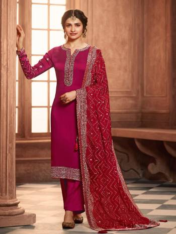 Grab This Very Beautiful Designer Straight Suit In Pink Color Paired With Pretty Embroidered Contrasted Colored Dupatta. Its Top Is Fabricated On Satin Georgette Paired With Santoon Bottom and Chinon Fabricated Dupatta. Buy This Designer Embroidered Suit Now