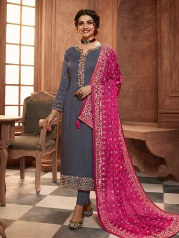 Grab This Very Beautiful Designer Straight Suit In Grey Color Paired With Pretty Embroidered Contrasted Colored Dupatta. Its Top Is Fabricated On Satin Georgette Paired With Santoon Bottom and Chinon Fabricated Dupatta. Buy This Designer Embroidered Suit Now