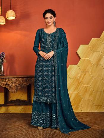 Grab This Pretty Suits In Fine Dark Color. Its Heavy Embroidery Top And Bottom Are Fabricated On Chinon Paired With Chinon Fabricated Dupatta. Get This Stitched As Per Your Desired Fit And Comfort.