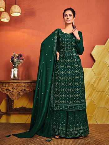 Grab This Pretty Suits In Fine Dark Color. Its Heavy Embroidery Top And Bottom Are Fabricated On Chinon Paired With Chinon Fabricated Dupatta. Get This Stitched As Per Your Desired Fit And Comfort.