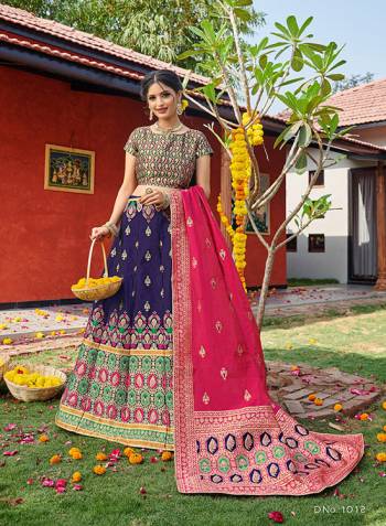 Look Pretty In This Designer Silk Based Lehenga Choli In Nevy Blue Color Paired With Contrasting Pink Colored Dupatta. It Is Fabricated On Banarasi Jacquard Silk Beautified With Weave All Over. Buy This Pretty Piece Now.? 