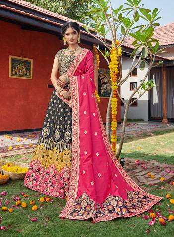 Look Pretty In This Designer Silk Based Lehenga Choli In Black Color Paired With Contrasting Pink Colored Dupatta. It Is Fabricated On Banarasi Jacquard Silk Beautified With Weave All Over. Buy This Pretty Piece Now.? 