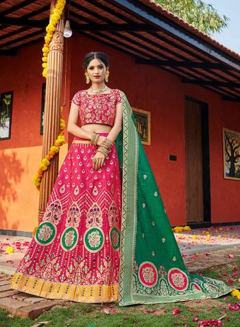 Look Pretty In This Designer Silk Based Lehenga Choli In Pink Color Paired With Contrasting Green Colored Dupatta. It Is Fabricated On Banarasi Jacquard Silk Beautified With Weave All Over. Buy This Pretty Piece Now.? 