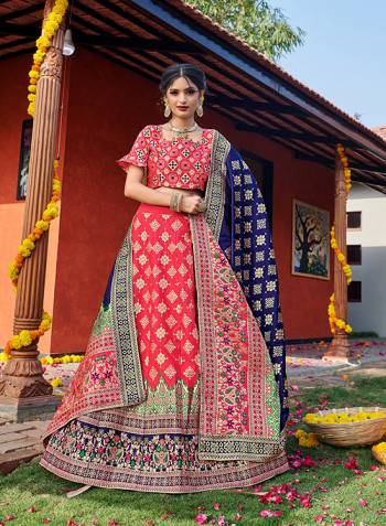 Look Pretty In This Designer Silk Based Lehenga Choli In Peach Color Paired With Contrasting Nevy Blue Colored Dupatta. It Is Fabricated On Banarasi Jacquard Silk Beautified With Weave All Over. Buy This Pretty Piece Now.? 