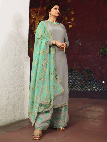 Look Pretty This Designer Long Length Suit In Lovely Color.?Its Pretty Embroidred Top Is Georgette Based Paired With Santoon Bottom And Chiffon Fabricated Embroidered Dupatta Which Gives An Attractive To The Suit.