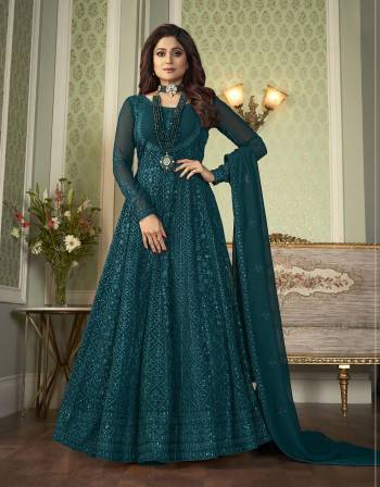 You Will Definitely Earn Lots Of Compliments Wearing This Lovely Floor Length Heavy Designer Embroidery Work Suit In Fine Dark Color. Its Top Is Fabricated On Gergette paired With Santoon Bottom And Georgette Fabricated Dupatta.