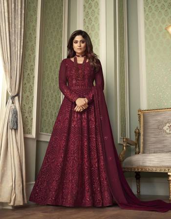 You Will Definitely Earn Lots Of Compliments Wearing This Lovely Floor Length Heavy Designer Embroidery Work Suit In Fine Dark Color. Its Top Is Fabricated On Gergette paired With Santoon Bottom And Georgette Fabricated Dupatta.