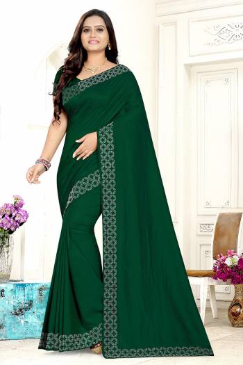 Adorn The Pretty Angelic Look Wearing This Heavy Designer Stone Work Saree In Green Color Paired With Blouse. This Saree Is Fabricated On Vichitra Silk Silk Paired With Banglori Silk Fabricated Blouse. Its Pretty Color Pallete Will Give An Attractive Look To Your Personality. 