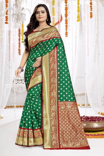 Garb The Pretty Angelic Look Wearing This Heavy Designer Wevon Jacquard Work Saree In Fine Color Paired With Blouse. This Saree Is Fabricated On Banarasi Silk Paired With Banarasi Silk Fabricated Blouse. Its Pretty Color Pallete Will Give An Attractive Look To Your Personality. 